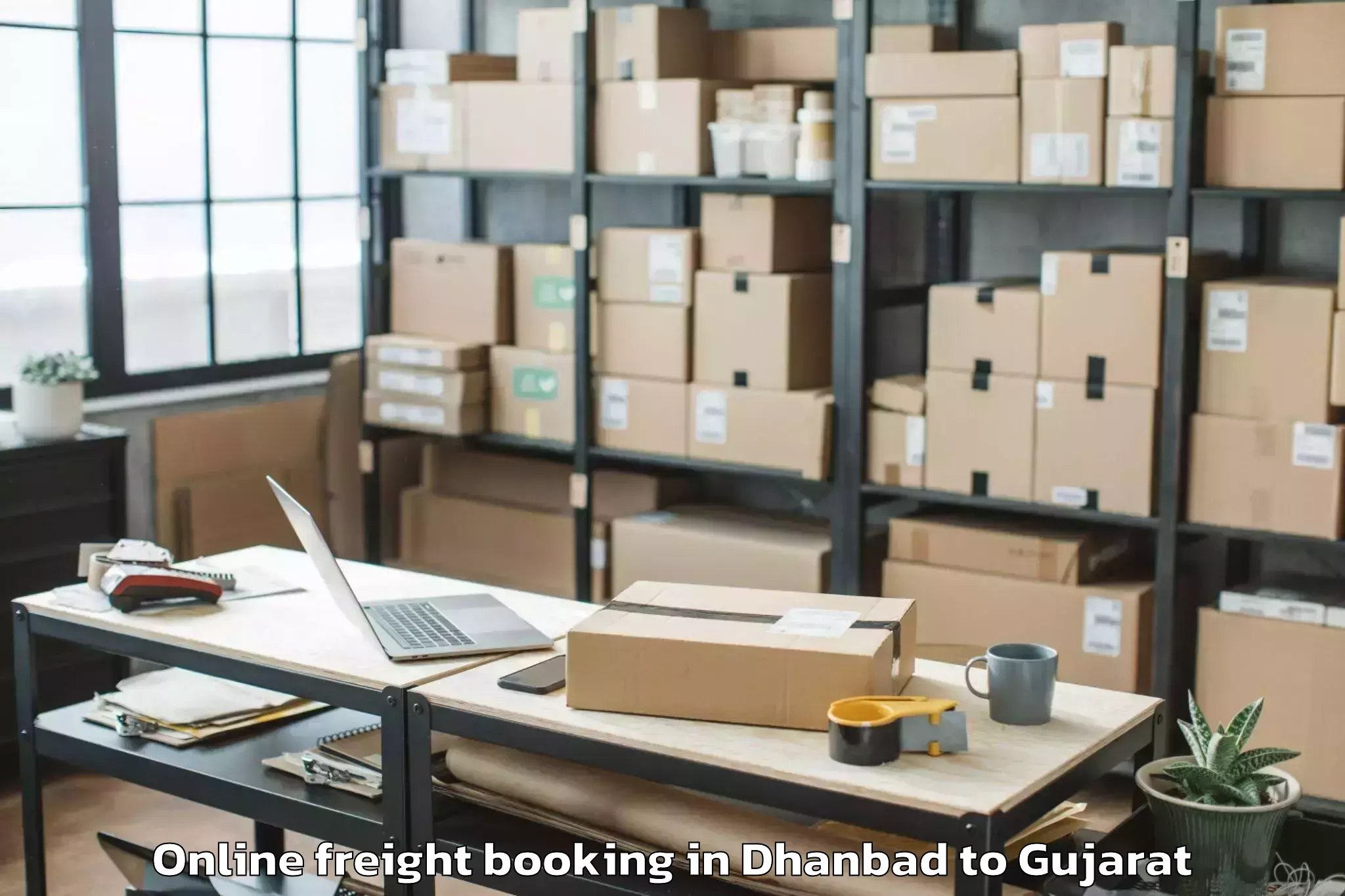 Easy Dhanbad to Una Gir Somnath Online Freight Booking Booking